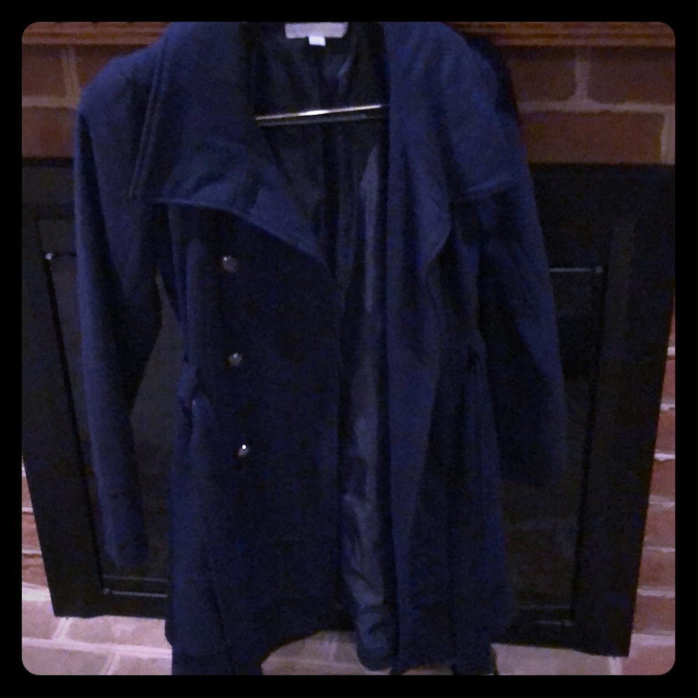 Blue Peacoat with cute ruffle bottom derail.